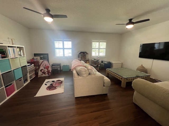 16629 74th Ave N, Palm Beach Gardens, FL 33418 - living area featuring a ceiling fan, a textured ceiling, and wood finished floors