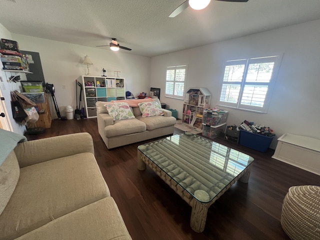 16629 74th Ave N, Palm Beach Gardens, FL 33418 - living room featuring a textured ceiling, a ceiling fan, and wood finished floors