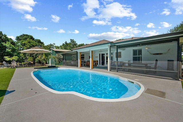 16629 74th Ave N, Palm Beach Gardens, FL 33418 - outdoor pool with a patio, ceiling fan, and french doors