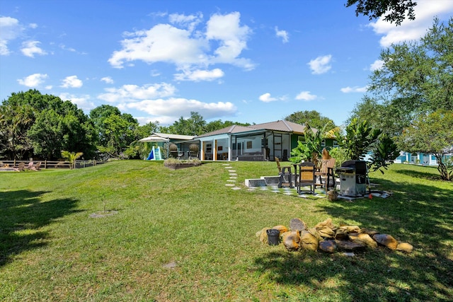 16629 74th Ave N, Palm Beach Gardens, FL 33418 - view of yard with a sunroom