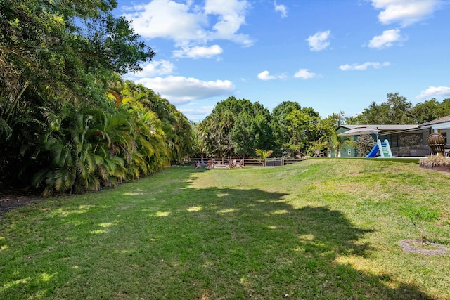 16629 74th Ave N, Palm Beach Gardens, FL 33418 - view of yard featuring fence