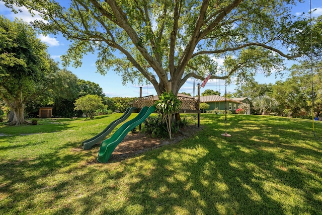 16629 74th Ave N, Palm Beach Gardens, FL 33418 - view of play area with a yard