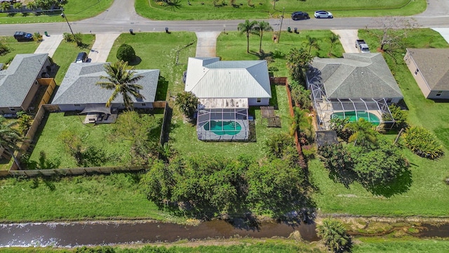 509 SW Feldman Ave, Port Saint Lucie, FL 34953 - aerial perspective of suburban area with a pool