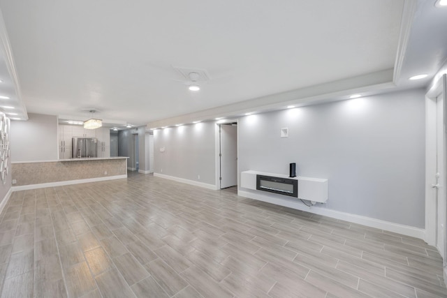 9305 Flynn Cir Unit 8, Boca Raton, FL 33496 - unfurnished living room with light wood-style flooring and recessed lighting