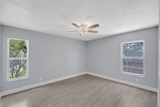 9305 Flynn Cir Unit 8, Boca Raton, FL 33496 - unfurnished room with ceiling fan and wood finished floors