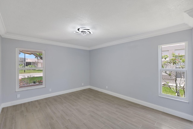 9305 Flynn Cir Unit 8, Boca Raton, FL 33496 - unfurnished room with crown molding, light wood-type flooring, and a textured ceiling