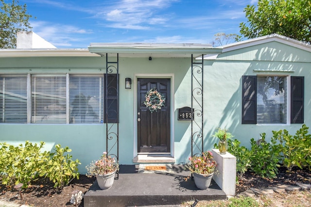 953 Churchill Rd, West Palm Beach, FL 33405 - property entrance with stucco siding