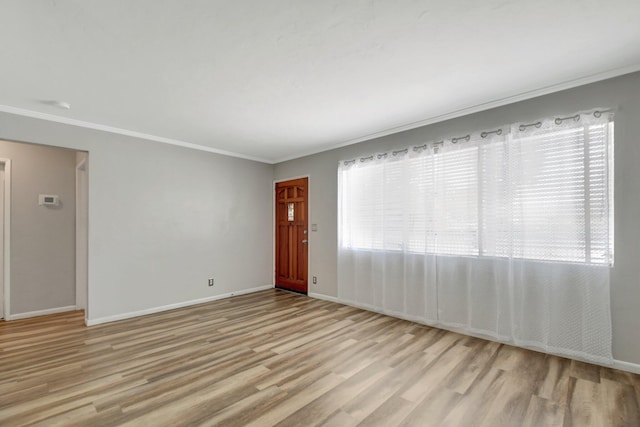953 Churchill Rd, West Palm Beach, FL 33405 - unfurnished room featuring ornamental molding, wood finished floors, and baseboards