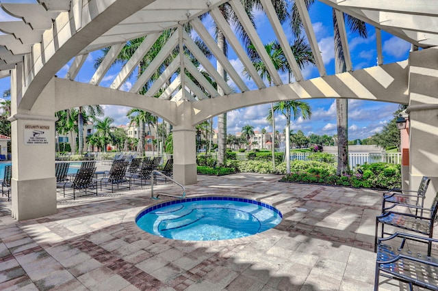 11039 Legacy Blvd Unit 203, Palm Beach Gardens, FL 33410 - view of swimming pool featuring fence and a patio