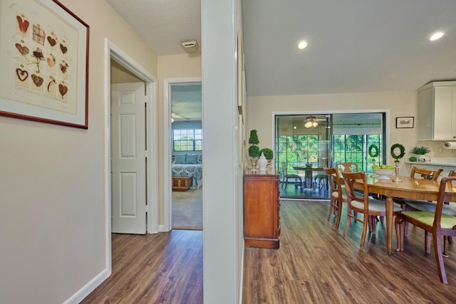 527 10th Ct, Vero Beach, FL 32962 - dining area featuring dark wood-style flooring, baseboards, and recessed lighting