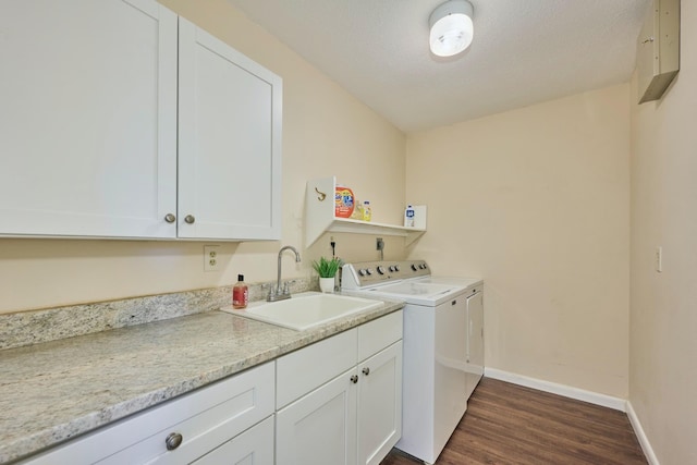 527 10th Ct, Vero Beach, FL 32962 - laundry room with independent washer and dryer, dark wood-type flooring, cabinet space, and baseboards