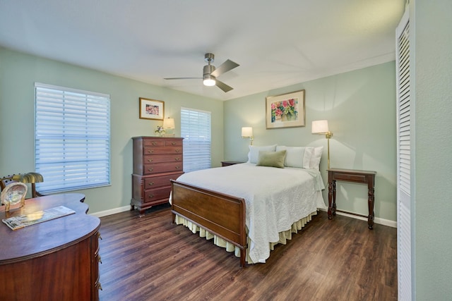 527 10th Ct, Vero Beach, FL 32962 - bedroom featuring dark wood-style floors, baseboards, and a ceiling fan