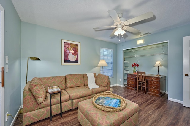 527 10th Ct, Vero Beach, FL 32962 - living room with wood finished floors, ceiling fan, baseboards, and a desk
