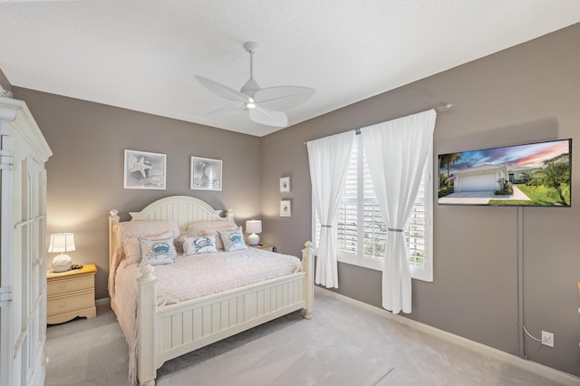 8483 Beaconhill Rd, Palm Beach Gardens, FL 33410 - carpeted bedroom featuring a ceiling fan and baseboards
