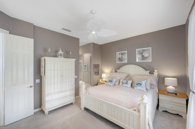 8483 Beaconhill Rd, Palm Beach Gardens, FL 33410 - bedroom with light colored carpet and a ceiling fan