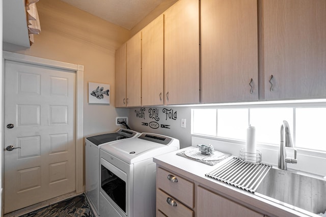 8483 Beaconhill Rd, Palm Beach Gardens, FL 33410 - clothes washing area featuring cabinet space and washing machine and dryer