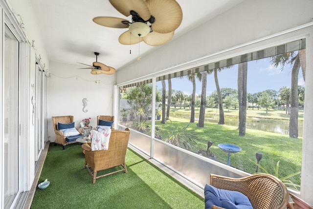8483 Beaconhill Rd, Palm Beach Gardens, FL 33410 - sunroom with a ceiling fan and a water view