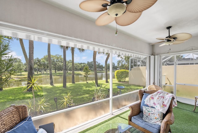 8483 Beaconhill Rd, Palm Beach Gardens, FL 33410 - sunroom / solarium featuring a water view, a ceiling fan, and view of scattered trees