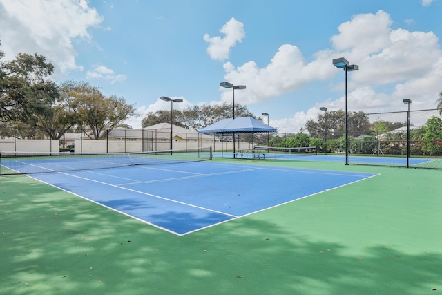 8483 Beaconhill Rd, Palm Beach Gardens, FL 33410 - view of tennis court with fence
