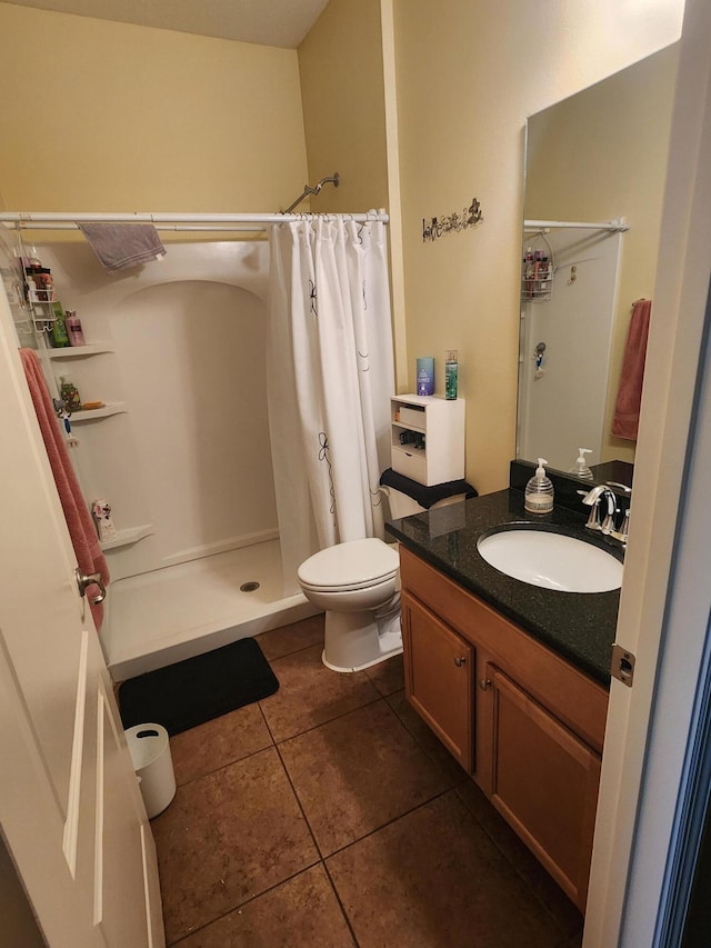 1691 SW Buttercup Ave, Port Saint Lucie, FL 34953 - full bathroom featuring tile patterned flooring, a shower with shower curtain, toilet, and vanity