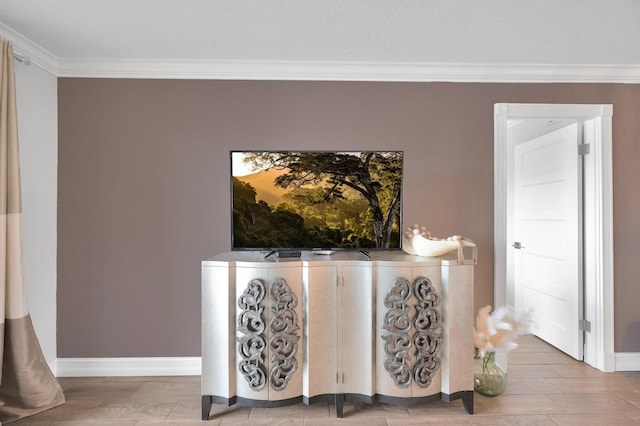 details featuring baseboards and ornamental molding