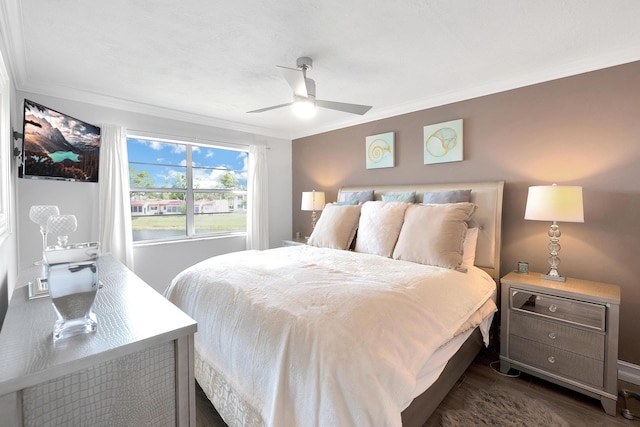 bedroom with ceiling fan, dark wood-style flooring, baseboards, and ornamental molding