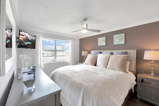 bedroom with crown molding, a ceiling fan, and dark wood-style flooring
