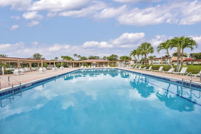 community pool with a patio