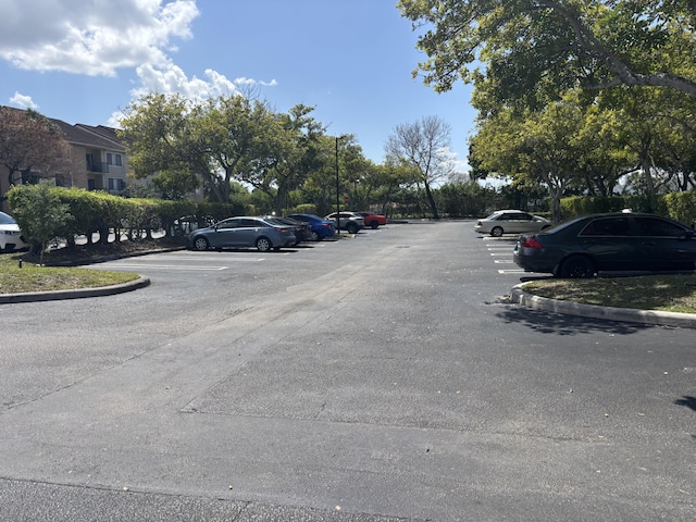 view of uncovered parking lot