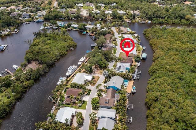 bird's eye view with a water view and a residential view