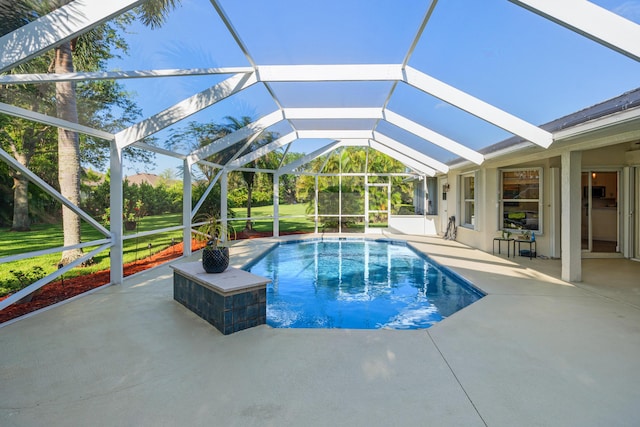 325 53rd Cir, Vero Beach, FL 32968 - pool with a patio area, a lanai, and a yard