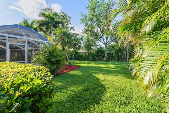 325 53rd Cir, Vero Beach, FL 32968 - view of yard featuring a lanai