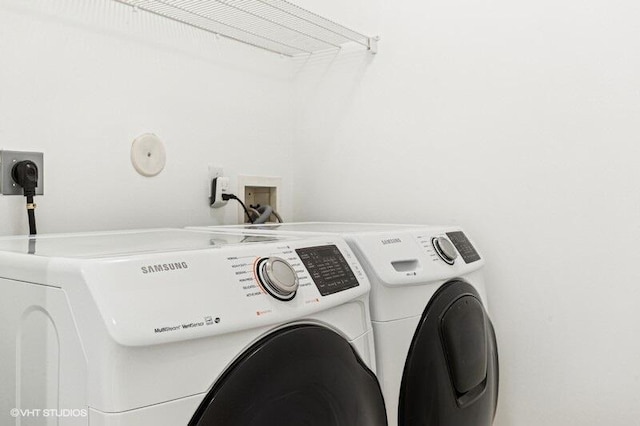 laundry area with independent washer and dryer and laundry area