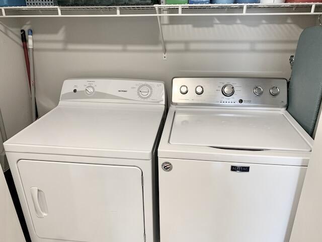 6562 Boca Del Mar Dr Unit 527, Boca Raton, FL 33433 - laundry area featuring washer and clothes dryer