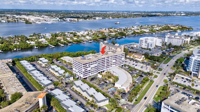 3589 S Ocean Blvd Unit 509, South Palm Beach, FL 33480 - aerial view of property's location featuring a large body of water and nearby urban area