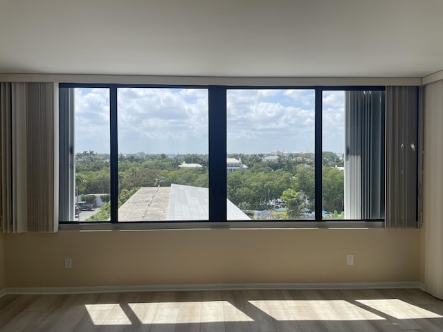 3589 S Ocean Blvd Unit 509, South Palm Beach, FL 33480 - spare room with wood finished floors and baseboards