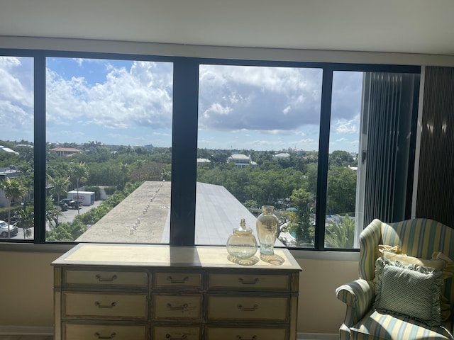 3589 S Ocean Blvd Unit 509, South Palm Beach, FL 33480 - sitting room with baseboards