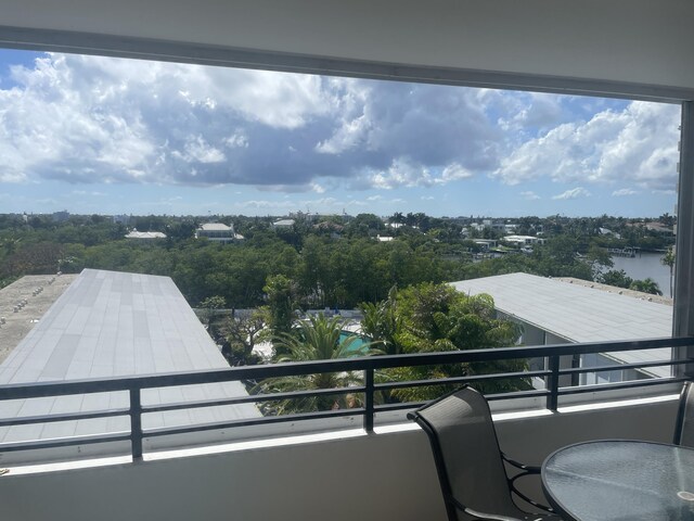 3589 S Ocean Blvd Unit 509, South Palm Beach, FL 33480 - bedroom featuring wood finished floors and ensuite bathroom