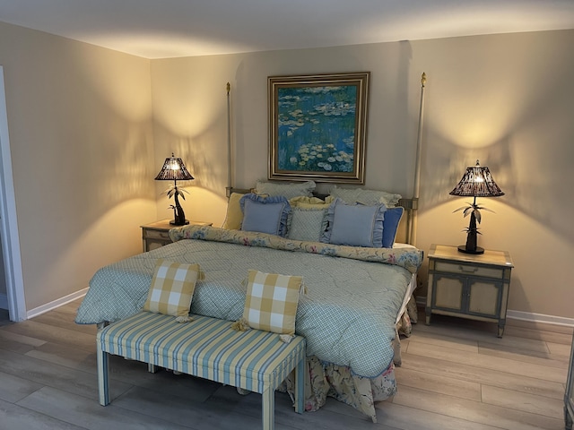 3589 S Ocean Blvd Unit 509, South Palm Beach, FL 33480 - bedroom with light wood-style floors and baseboards
