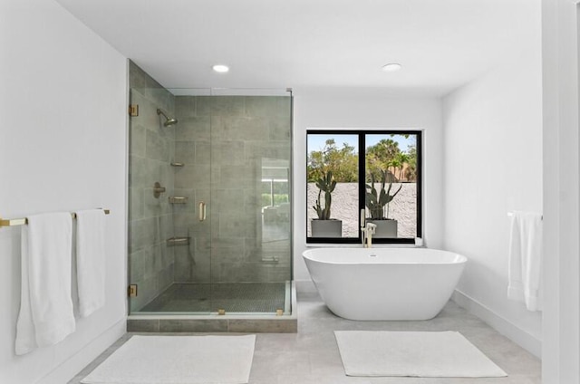11020 Boca Woods Ln, Boca Raton, FL 33428 - full bath with a stall shower, a freestanding bath, recessed lighting, and baseboards