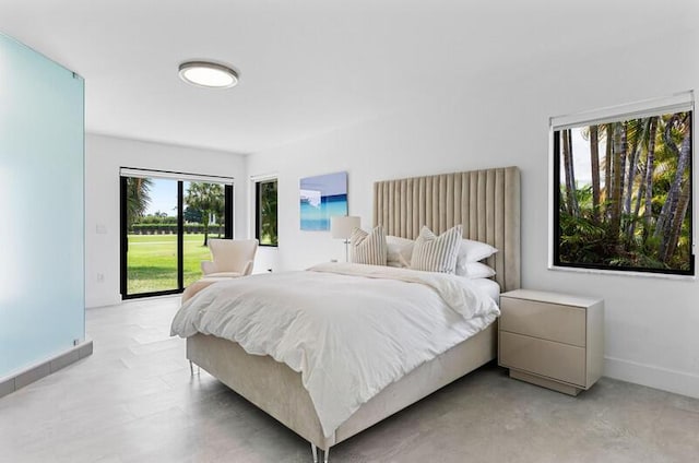 11020 Boca Woods Ln, Boca Raton, FL 33428 - bedroom featuring access to exterior and baseboards