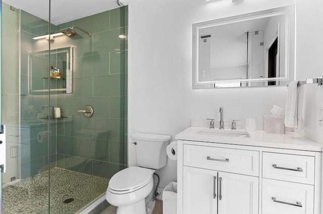 11020 Boca Woods Ln, Boca Raton, FL 33428 - bathroom featuring a shower stall, toilet, and vanity