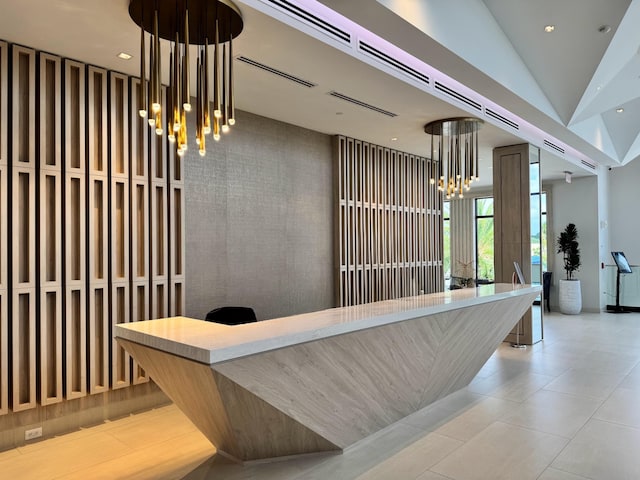 11020 Boca Woods Ln, Boca Raton, FL 33428 - reception area featuring a chandelier