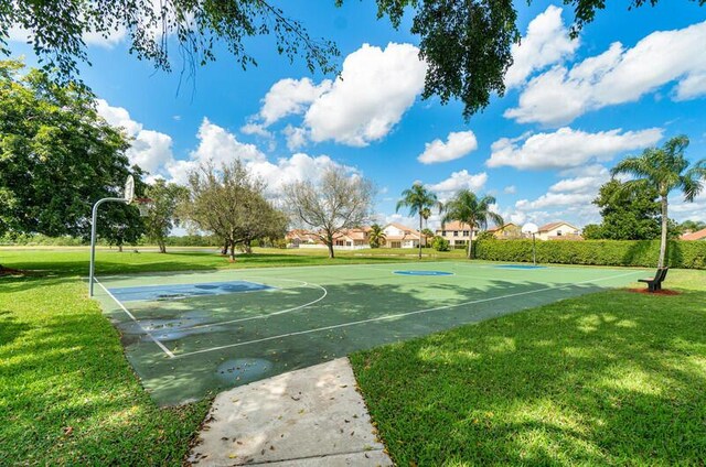 11020 Boca Woods Ln, Boca Raton, FL 33428 - view of basketball court featuring a yard and community basketball court