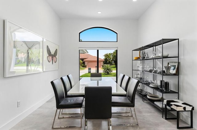 11020 Boca Woods Ln, Boca Raton, FL 33428 - dining space featuring baseboards, recessed lighting, and concrete flooring