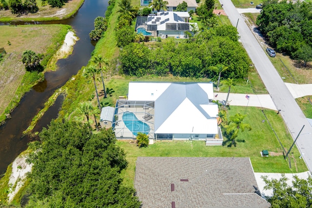 2266 SW Monterrey Ln, Port Saint Lucie, FL 34953 - view of subject property featuring a pool and a nearby body of water