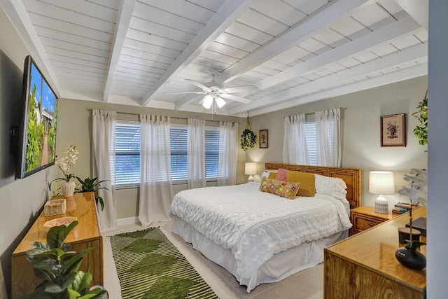 1008 SE 3rd St, Boynton Beach, FL 33435 - bedroom with beamed ceiling, a ceiling fan, wooden ceiling, and light tile patterned floors
