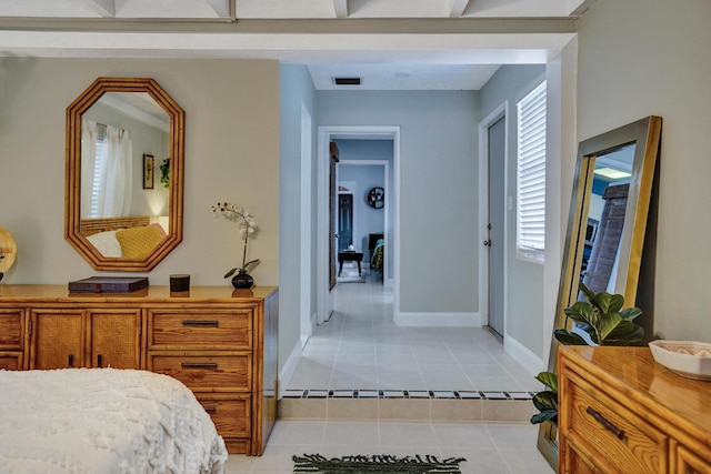 1008 SE 3rd St, Boynton Beach, FL 33435 - bedroom with visible vents, baseboards, and light tile patterned floors