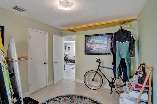 1008 SE 3rd St, Boynton Beach, FL 33435 - interior space with visible vents, tile patterned floors, and baseboards