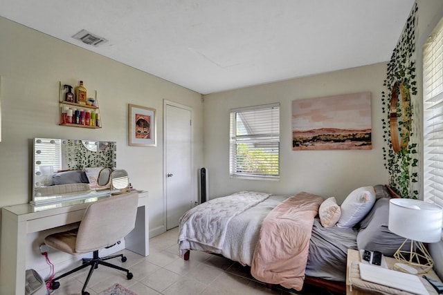 1008 SE 3rd St, Boynton Beach, FL 33435 - bedroom featuring visible vents and light tile patterned floors